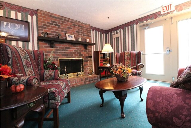 living room featuring brick wall, carpet, and a brick fireplace