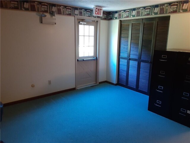 unfurnished bedroom featuring a closet and carpet