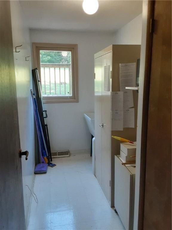 bathroom with visible vents and tile patterned floors