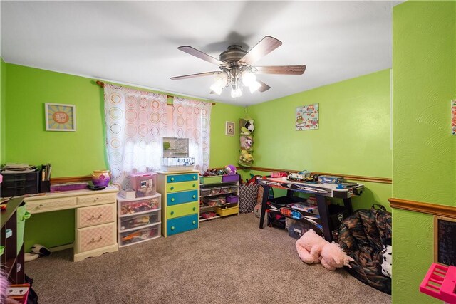 game room with carpet flooring and ceiling fan