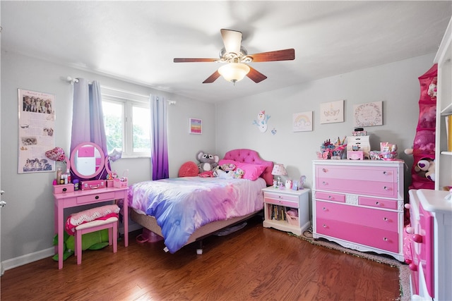 bedroom featuring hardwood / wood-style flooring and ceiling fan