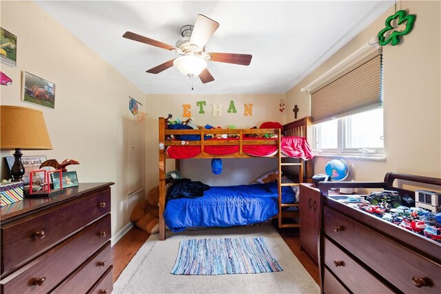 bedroom featuring ceiling fan and light wood-type flooring