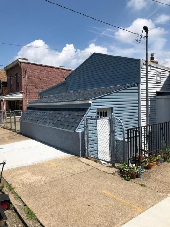 view of property exterior with a garage