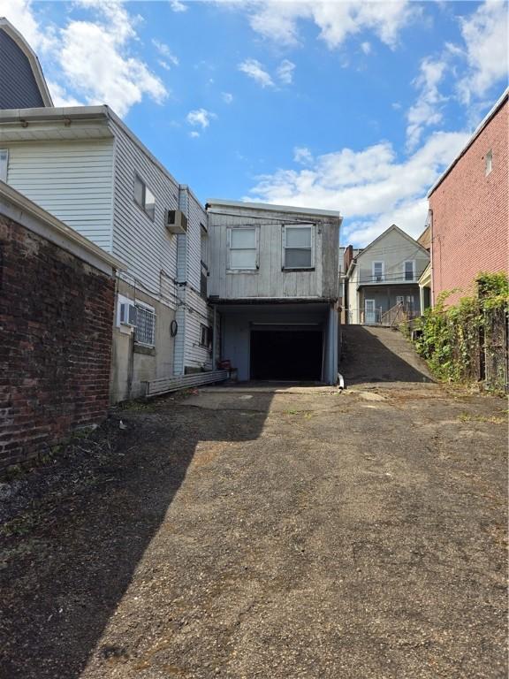 exterior space with a garage