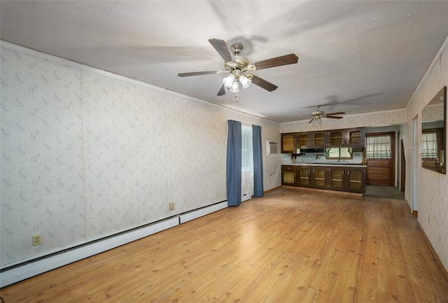 unfurnished living room featuring light hardwood / wood-style flooring, a baseboard radiator, ceiling fan, crown molding, and a wall mounted AC