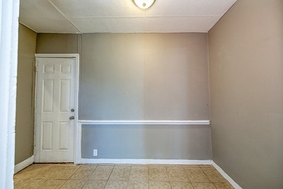 view of tiled spare room