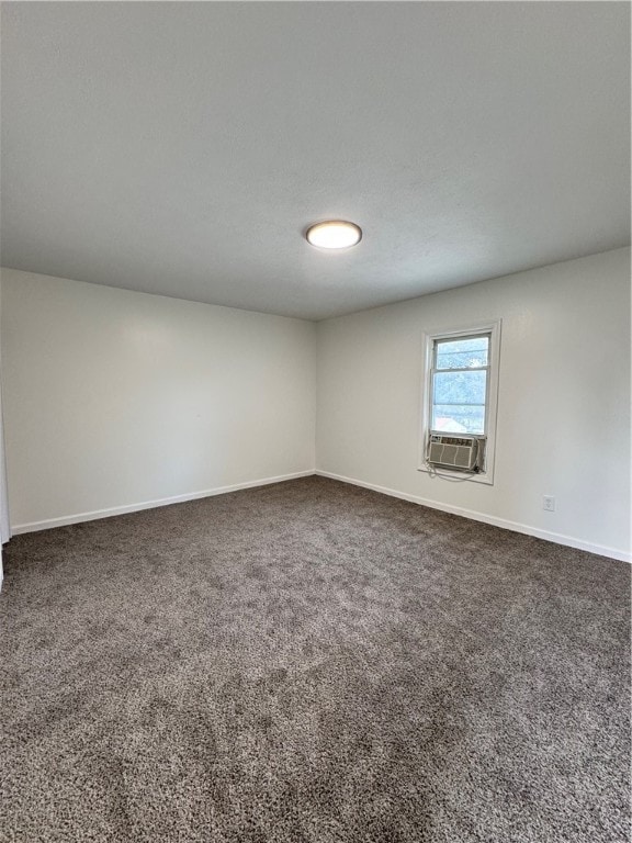 carpeted empty room with cooling unit