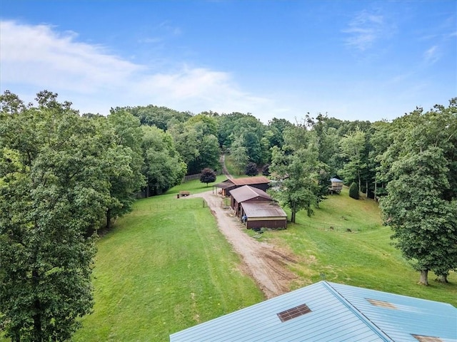 birds eye view of property with a rural view