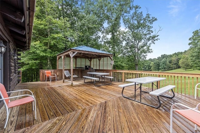 wooden deck featuring a gazebo