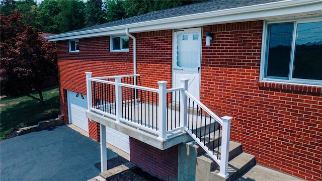 entrance to property featuring a garage