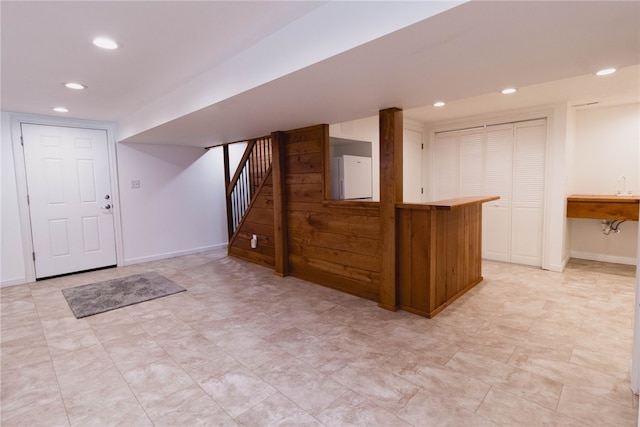 basement with light tile patterned floors