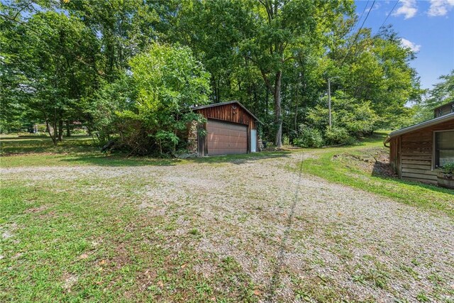 186 Lake Road Ln, Middlecreek Twp, PA 15557 - view of yard featuring a detached garage and an outbuilding