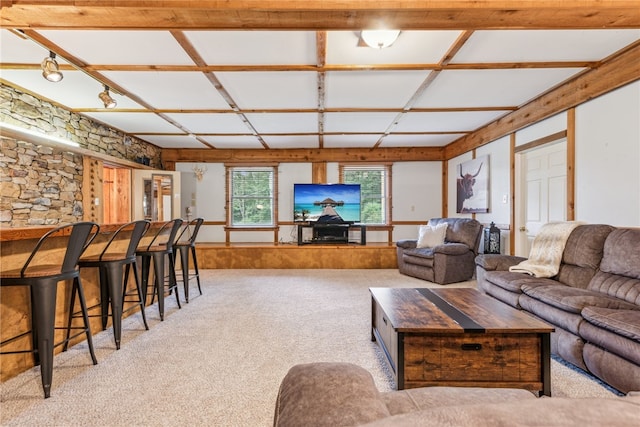 carpeted living room with coffered ceiling