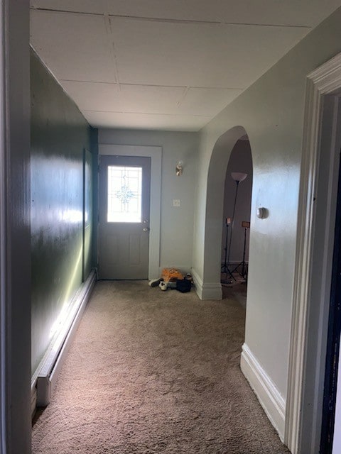 corridor with carpet flooring