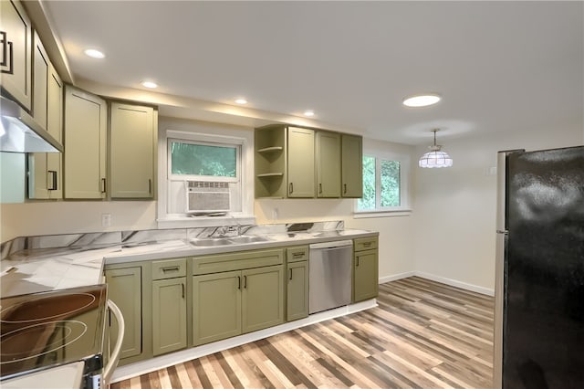 kitchen with light wood-type flooring, black refrigerator, stainless steel dishwasher, sink, and range with electric cooktop