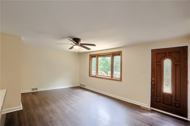 foyer featuring ceiling fan and dark hardwood / wood-style floors