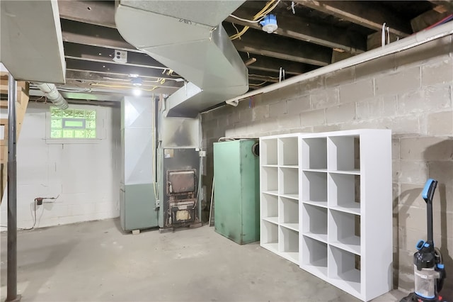 basement featuring heating unit