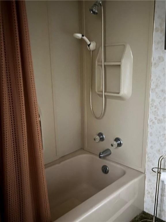 bathroom with shower / bath combination with curtain