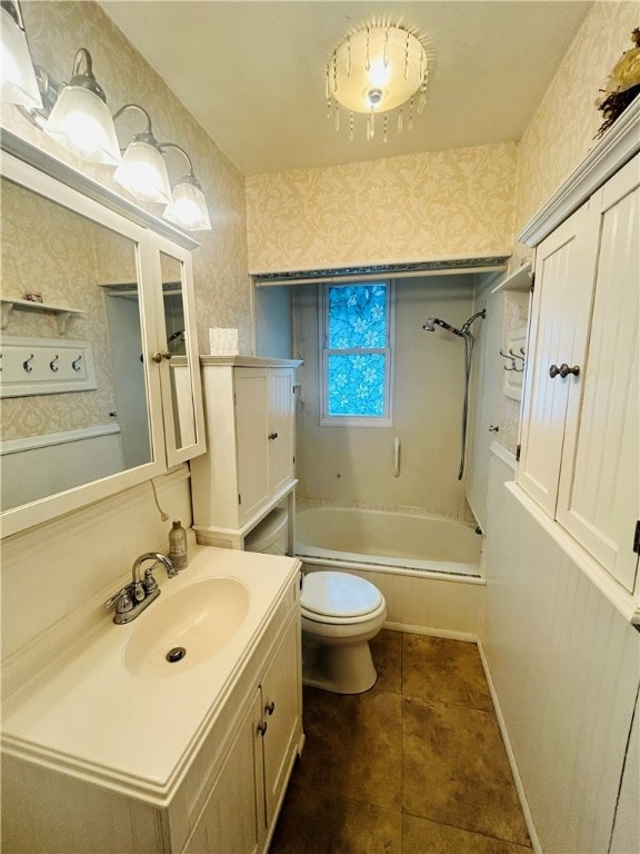 full bathroom featuring shower / washtub combination, vanity, tile patterned flooring, and toilet