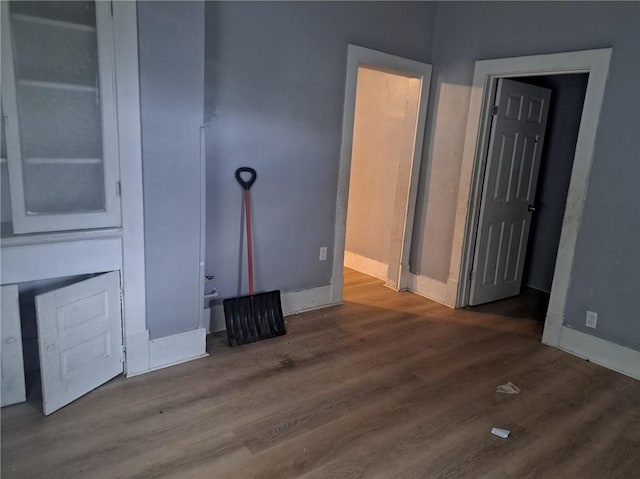 unfurnished living room with hardwood / wood-style floors