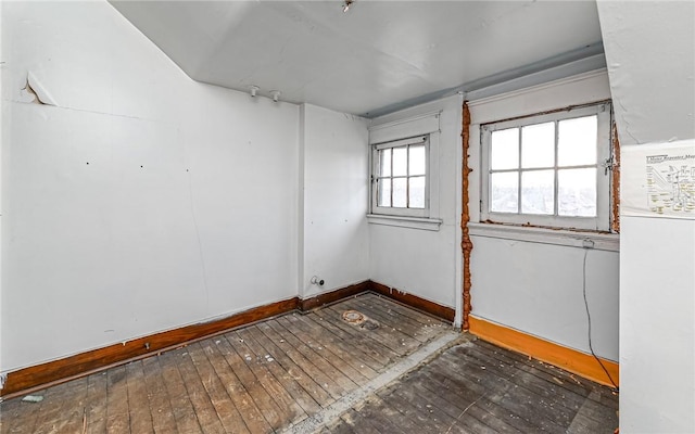 empty room featuring dark hardwood / wood-style floors