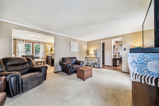 carpeted living room with crown molding