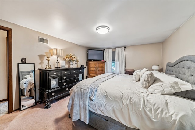 bedroom featuring carpet