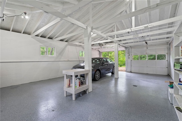 3326 New England Rd, West Mifflin, PA 15122 - garage featuring concrete block wall