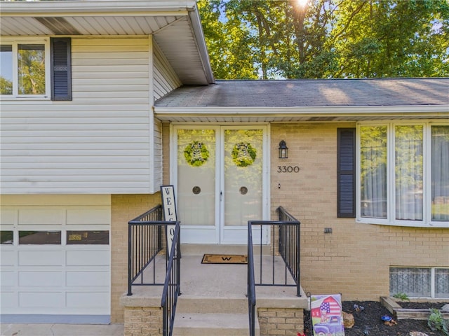 property entrance with a garage