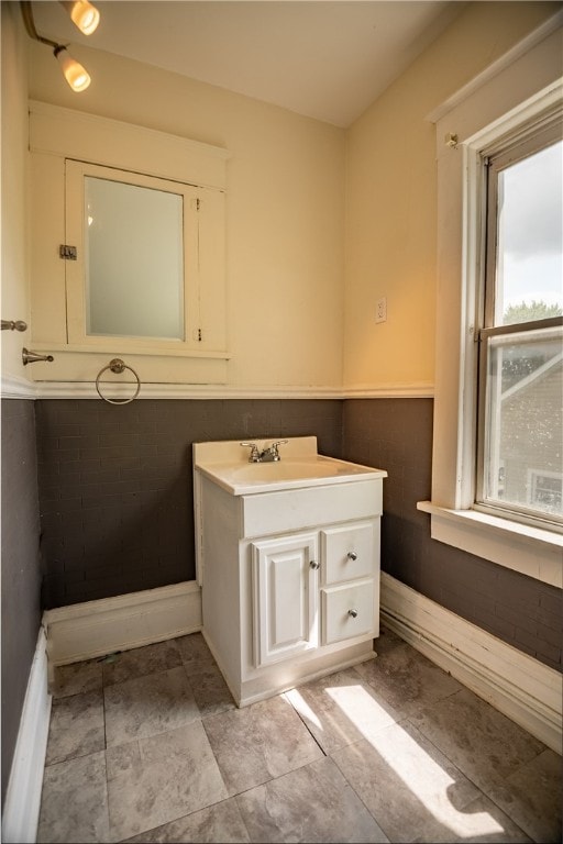 bathroom featuring vanity and tile patterned flooring