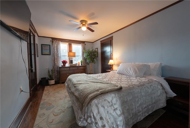 bedroom with crown molding and ceiling fan