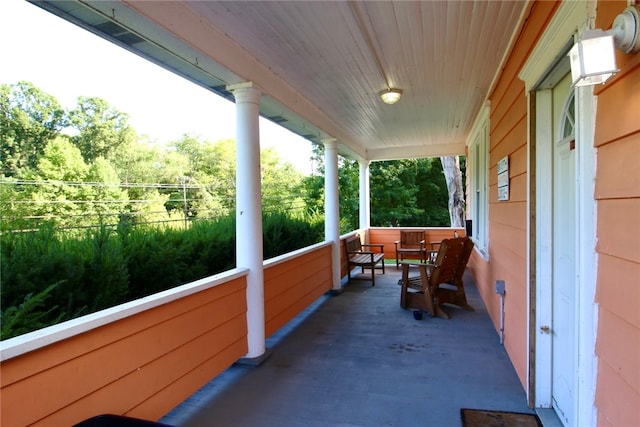 view of patio featuring a porch