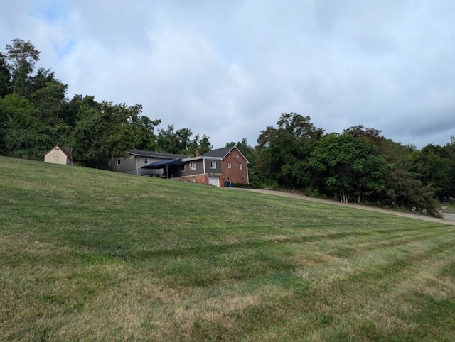 view of yard featuring a garage