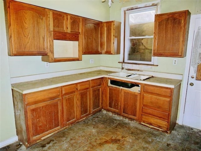 kitchen with dark tile patterned flooring