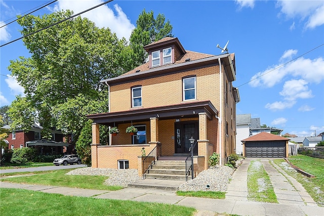 view of front of home with an outdoor structure, covered porch, and a garage