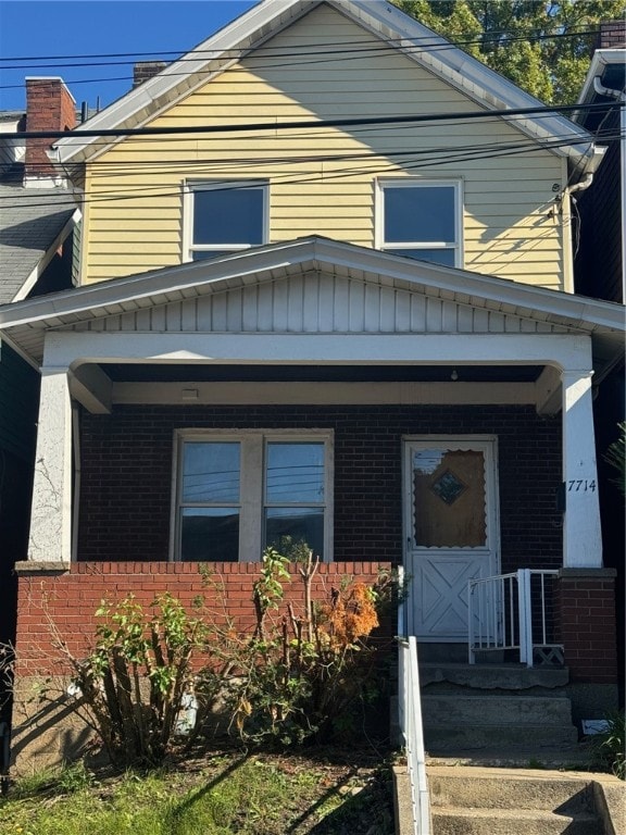 view of front of home with covered porch