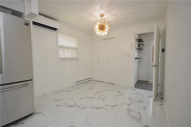 interior space featuring baseboard heating, light tile patterned flooring, and a wall mounted AC