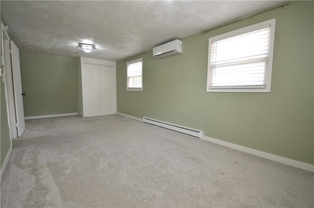 interior space featuring an AC wall unit, light carpet, and a baseboard radiator