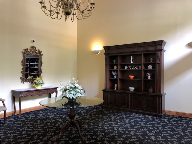 bar with a notable chandelier and carpet floors