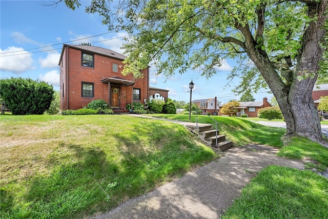 view of front of home with a front lawn