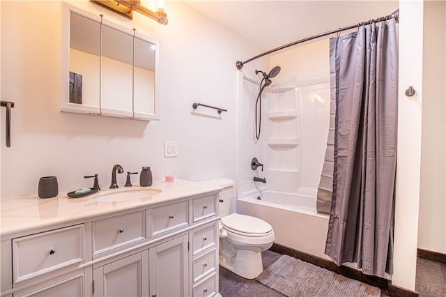 full bathroom featuring tile patterned floors, shower / tub combo, vanity, and toilet