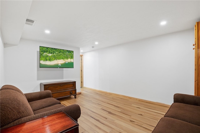 living room with light hardwood / wood-style floors