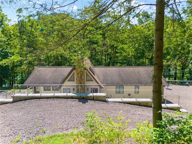 view of community featuring fence