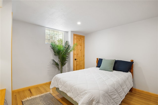 bedroom featuring wood-type flooring