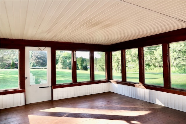 unfurnished sunroom featuring a healthy amount of sunlight