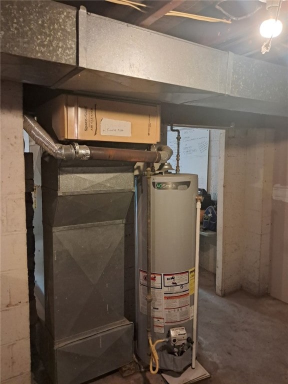 utility room with water heater