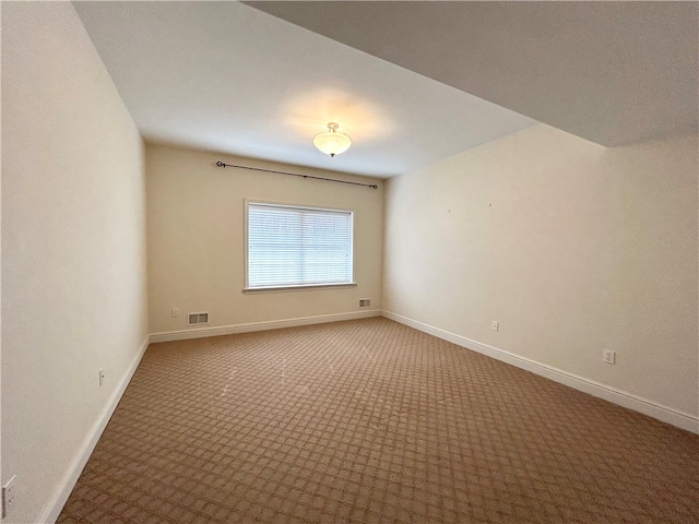 empty room featuring carpet