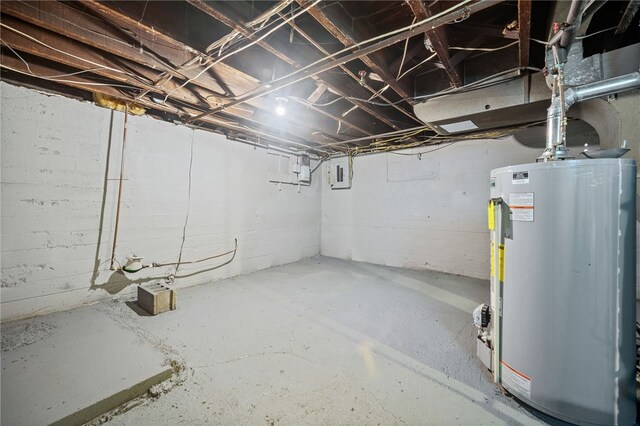 basement featuring water heater