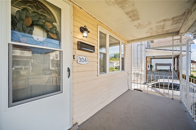 entrance to property with a porch