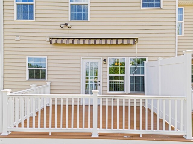 doorway to property with a deck